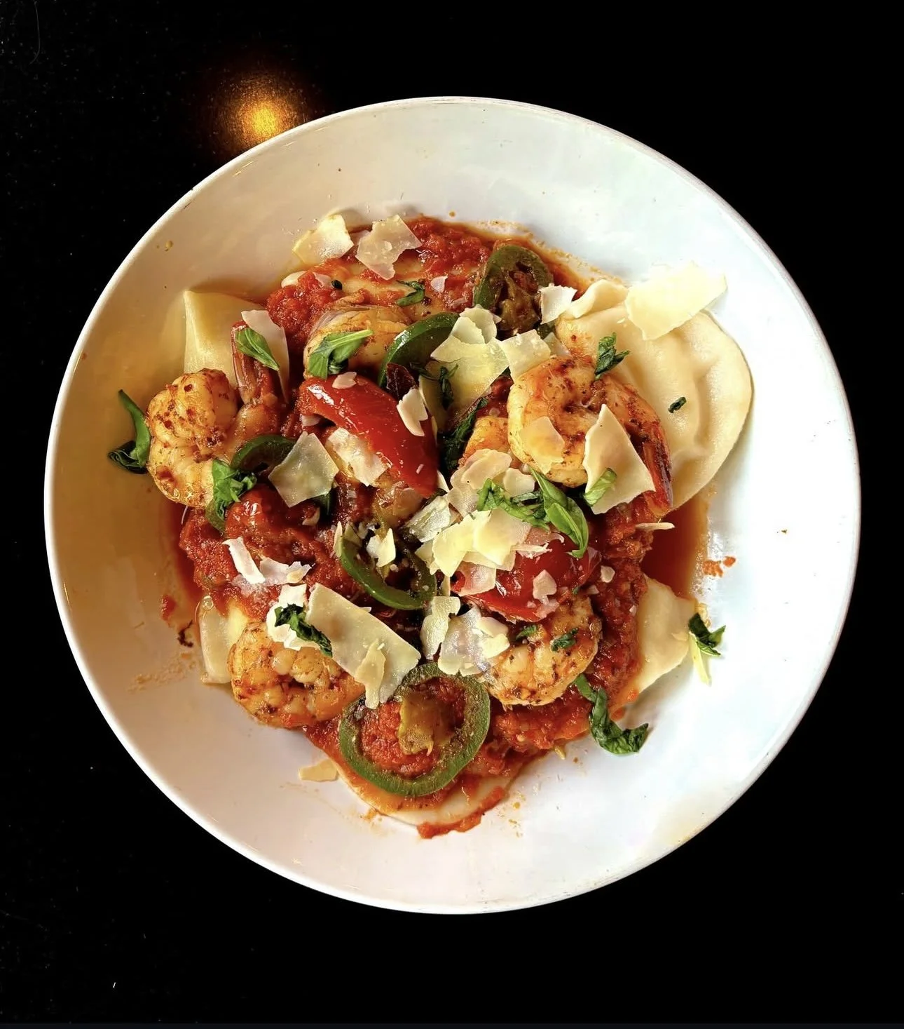 Shrimp Fra Diavolo: Served over pierogi.