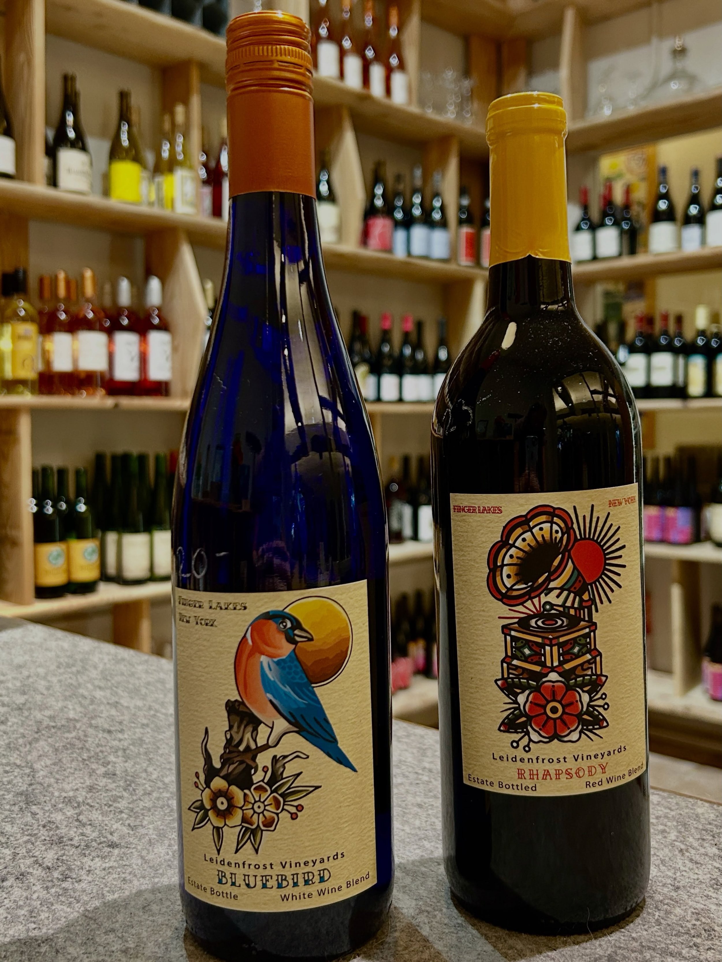 Leidenfrost vineyards is a small family run winery located in Hector, NY. They focus on  small batch, quality wines made from 100% estate grown grapes, and their beautiful bottles are just the beginning! We carry their white wine blend Bluebird, whic