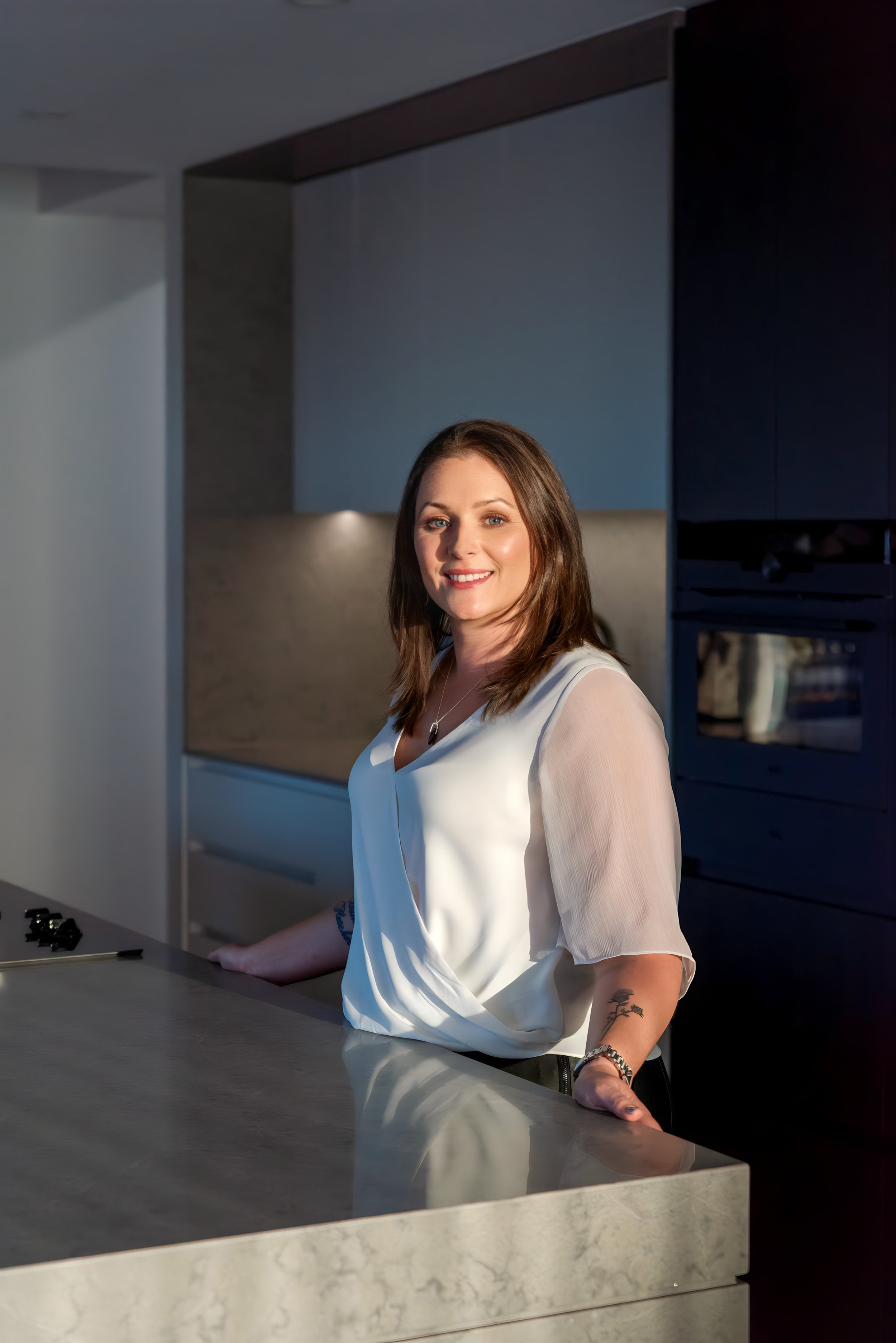 Building and interior designer Tahleah Hoyle, in a kitchen she designed in Devonport Tasmania