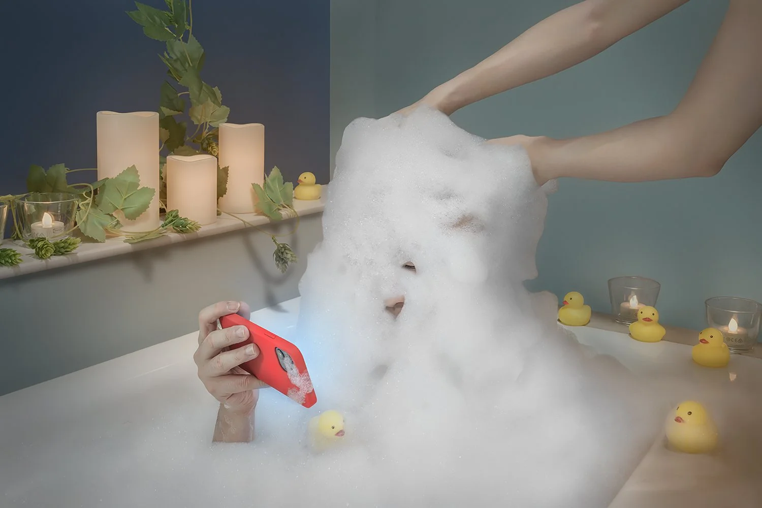 Glued to his phone as I bathe him like a baby.