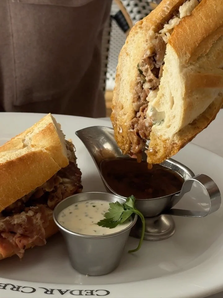 Prime Rib Sandwich 
thin-sliced prime rib, horseradish cream, provolone, onion straws, au jus,&ldquo;On the Rise&rdquo; baguette, french fries.