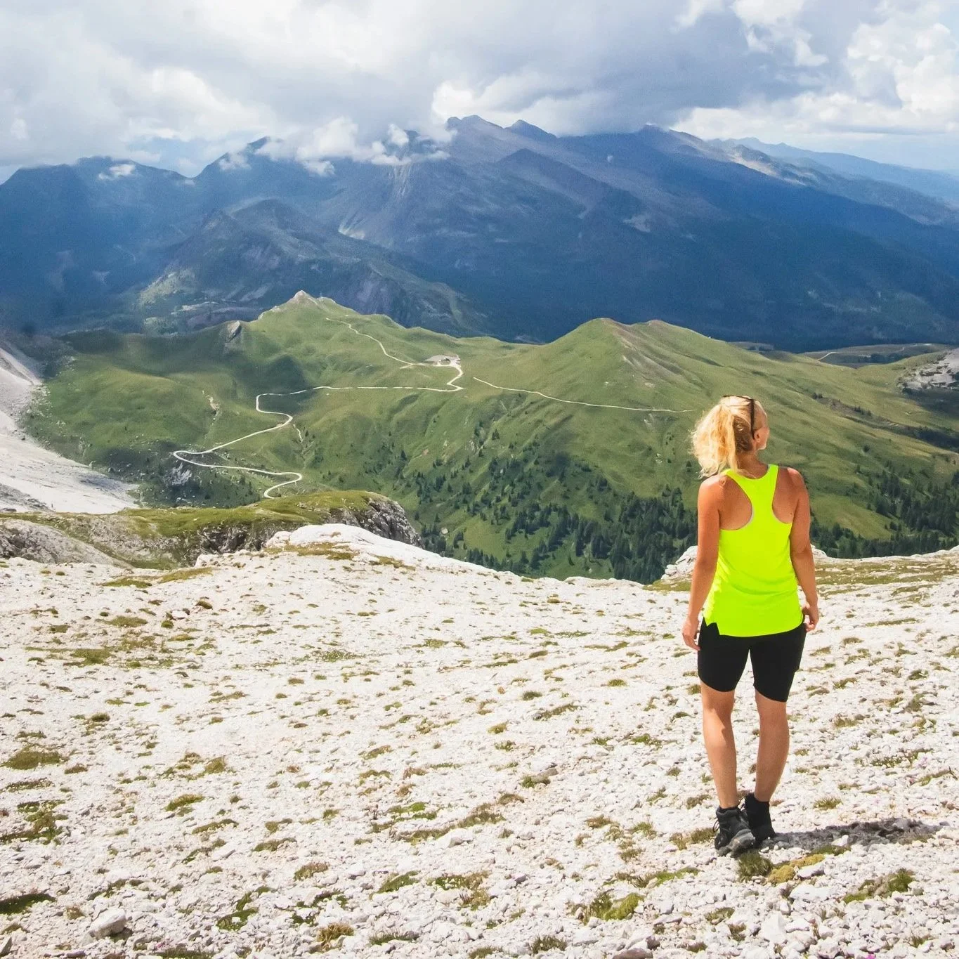 Woman standing in a mountain pass