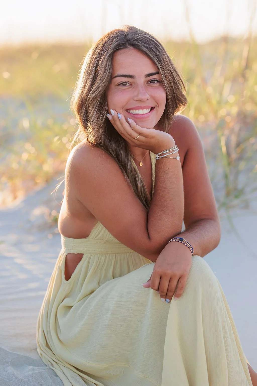 Tybee Island, GA, Senior Portrait Photographer, Lisa Barksdale, a lady in a yellow dress on the beach.