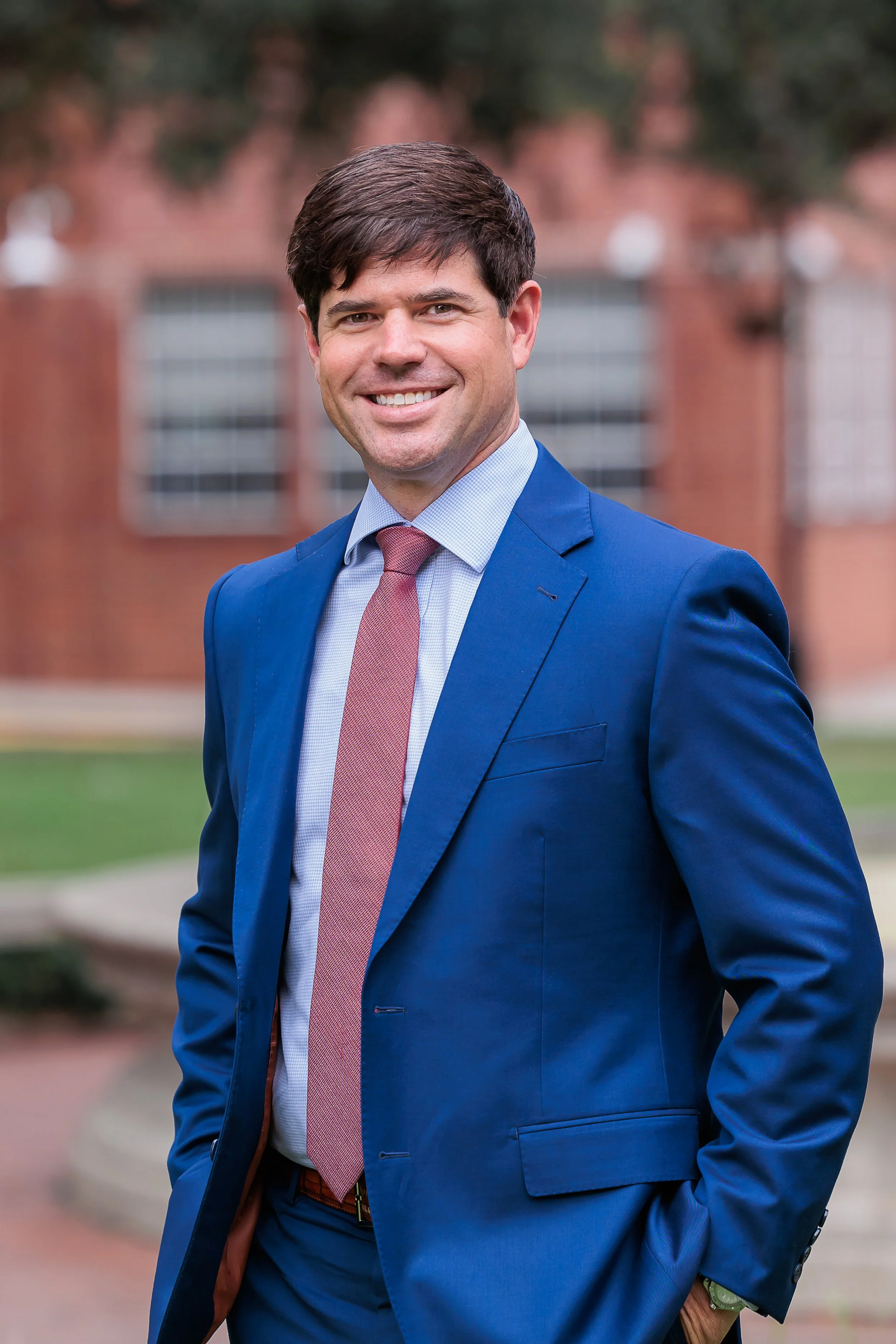 Savannah, GA, Professional Headshot Photographer, Lisa Barksdale, a man in a navy suite outside. 