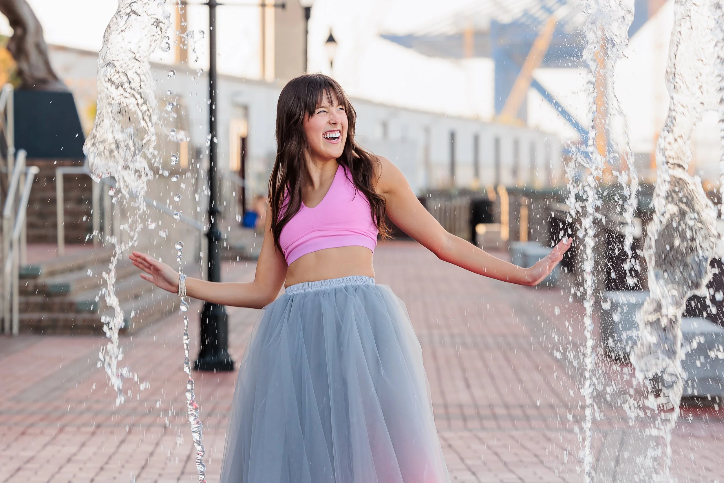 Savannah, GA, Senior Portrait Photographer, Lisa Barksdale, a senior girl splashing in the water.