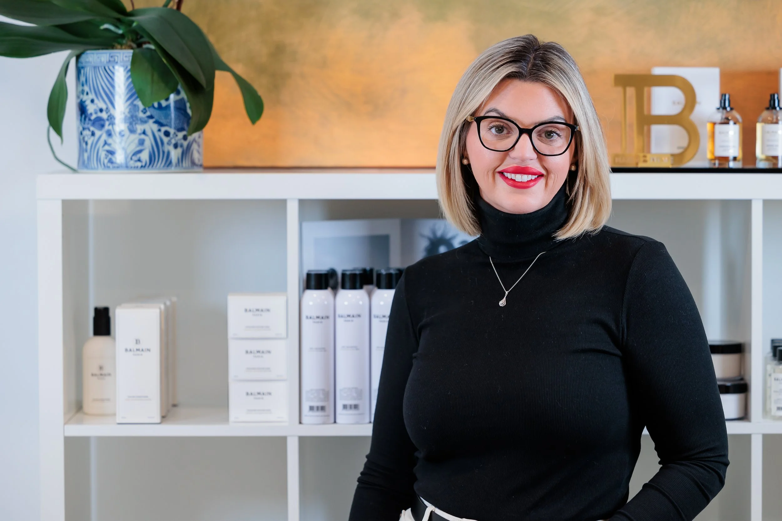 Savannah, Georgia, Professional Headshot Photographer, Lisa Barksdale, a woman in black in a salon.