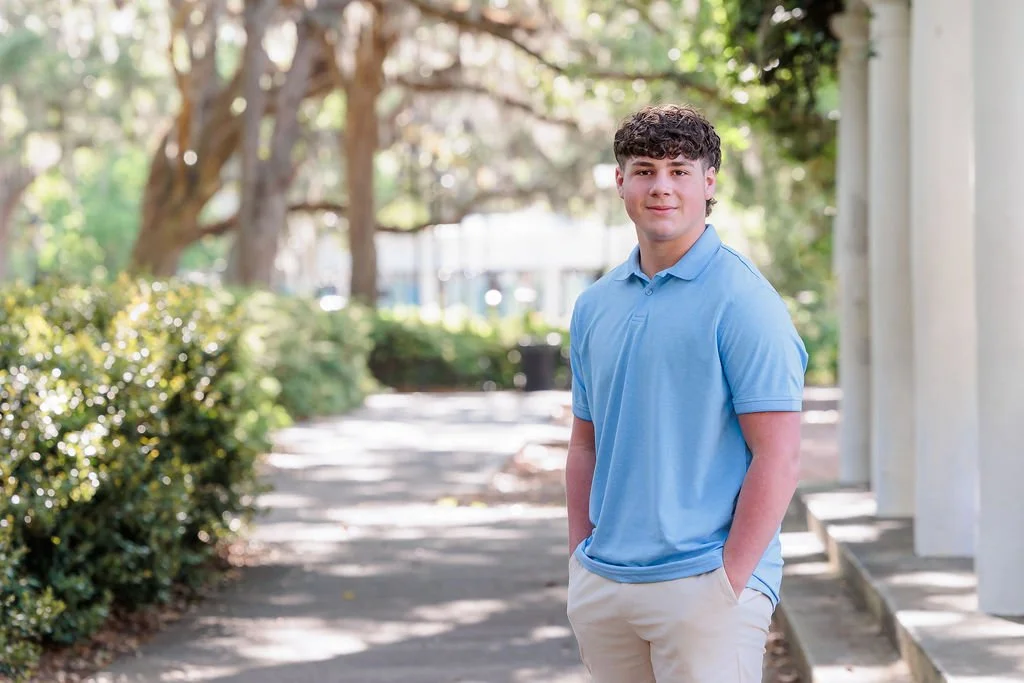 Savannah, Georgia, Senior Portrait Photographer, Lisa Barksdale, a senior boy in blue Downtown.