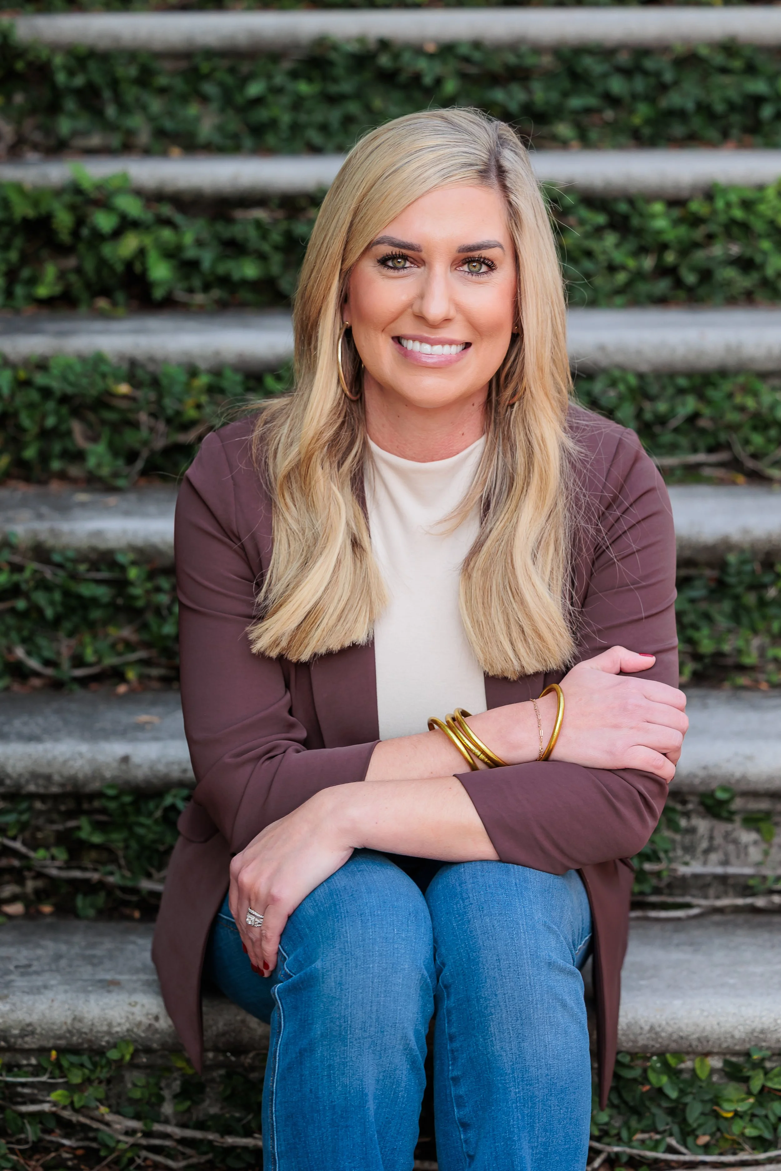 Savannah, Georgia, Professional Headshot Photographer, Lisa Barksdale, a blond woman sitting on an ivy staircase.
