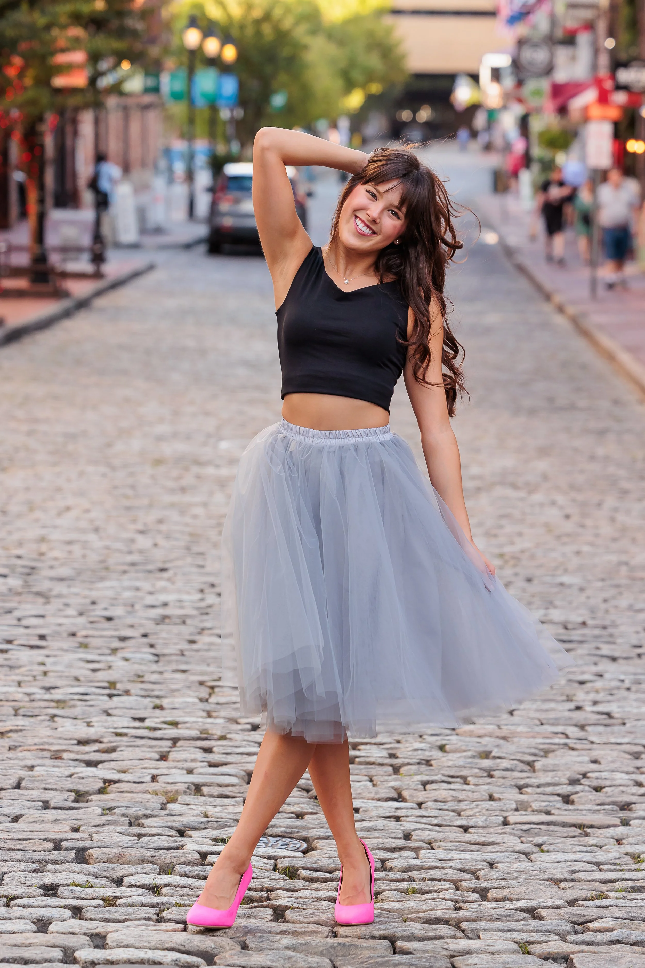 Savannah, Georgia, Senior Portrait Photographer, Lisa Barksdale, a young girl on the cobblestones Downtown.
