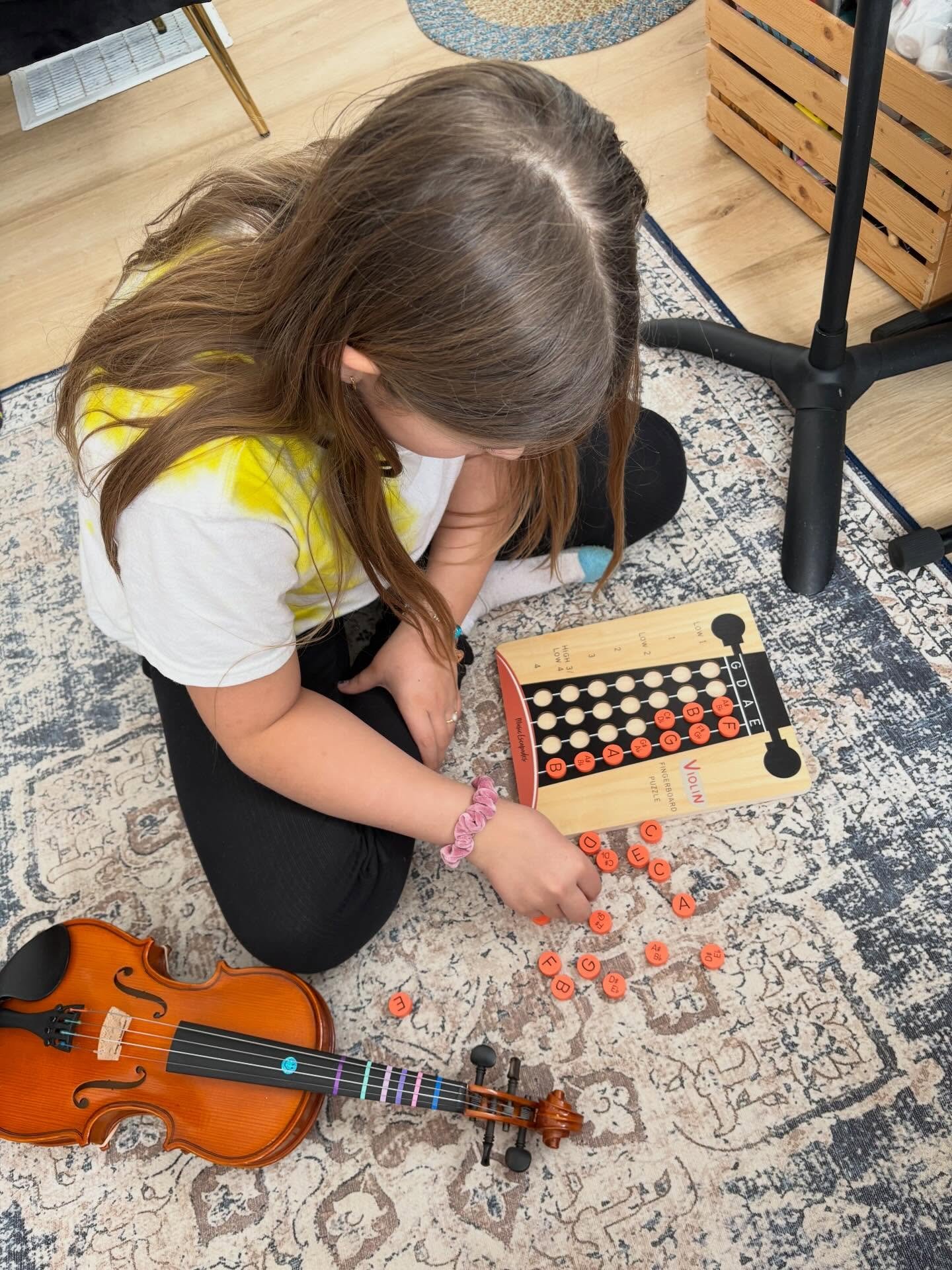 The violin fingerboard puzzle has arrived and my students are right into it! 🎻 Great teaching tool from Canadian business @musicescapades.shoppe