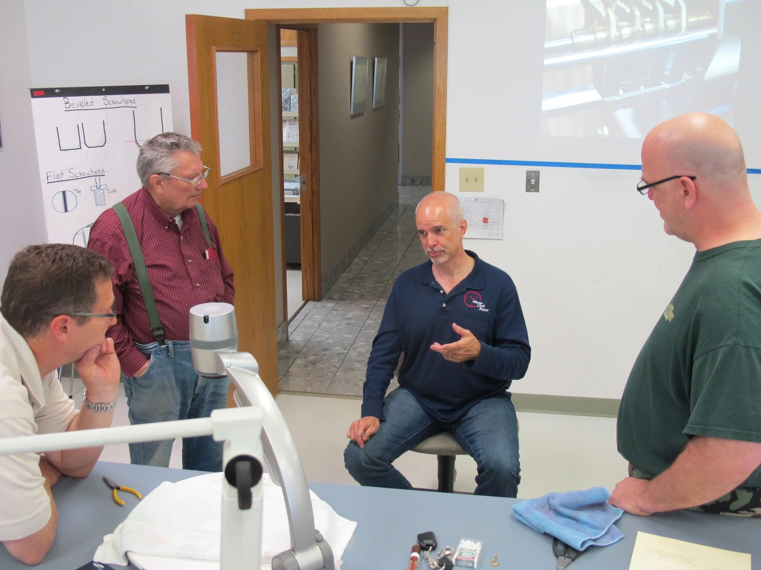 Master Clock Repair services Howard Miller Grandfather Clocks in Columbus, Ohio.JPG