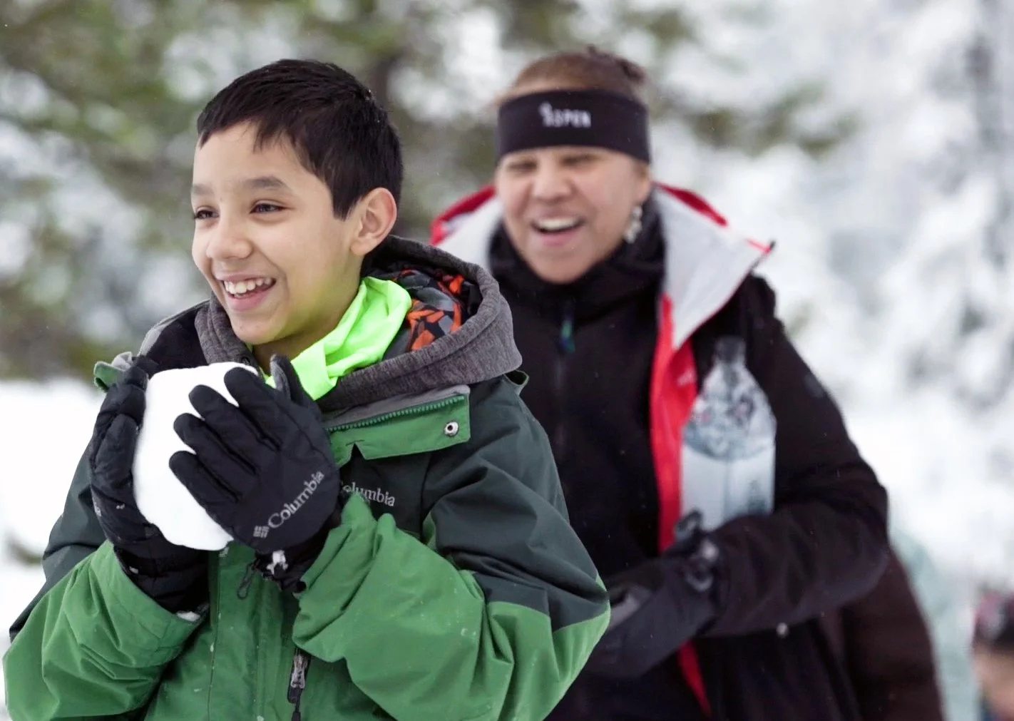 AWL-Year_End-Snowshoeing_Boy_Walking_in_line-Cropped.jpg