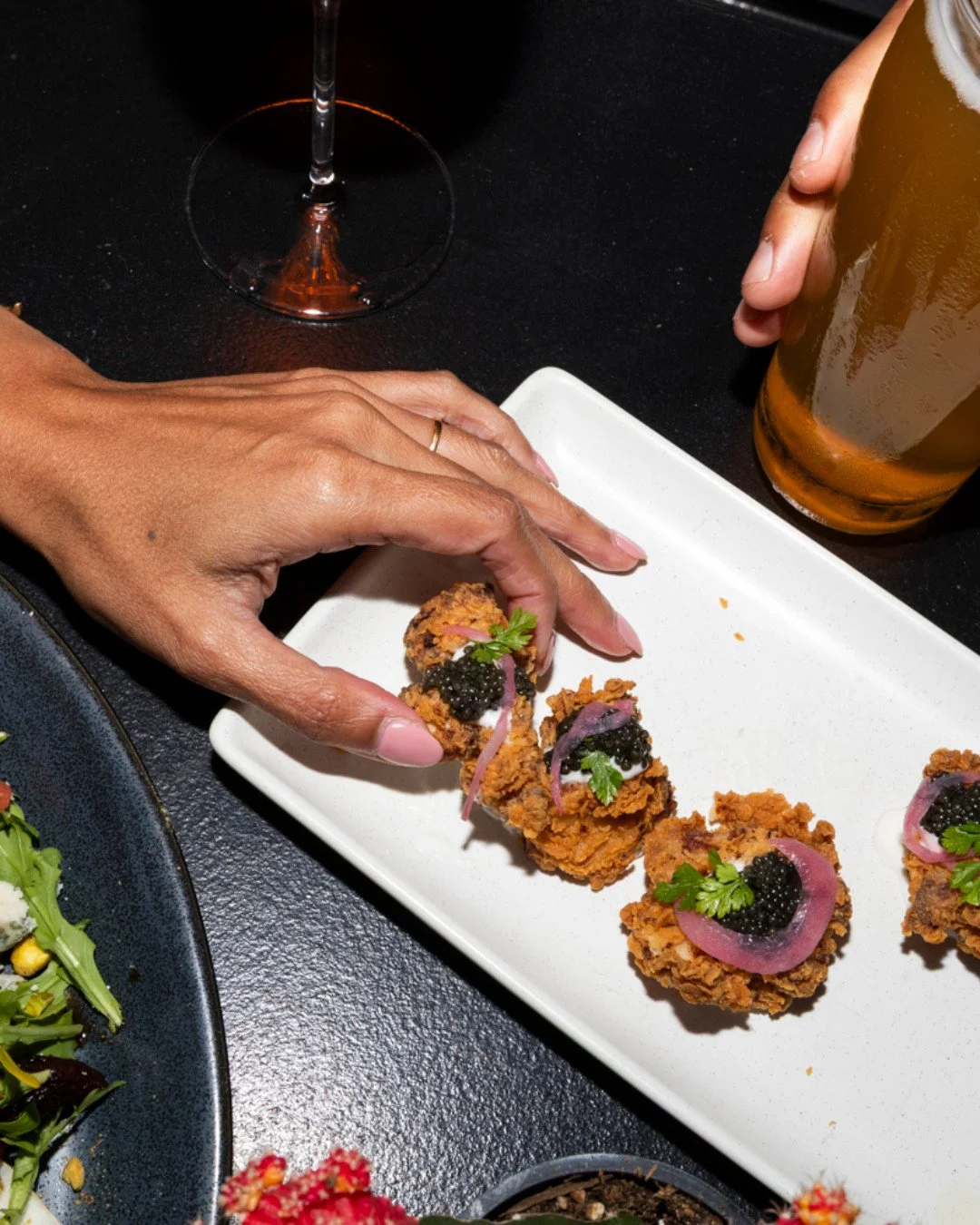 Host your next private event where the skyline meets timeless sophistication and curated tastes.

Our menu at High 5ive Rooftop Bar is designed for effortless social grazing, ensuring every guest finds a new favorite flavor between conversations. Rea