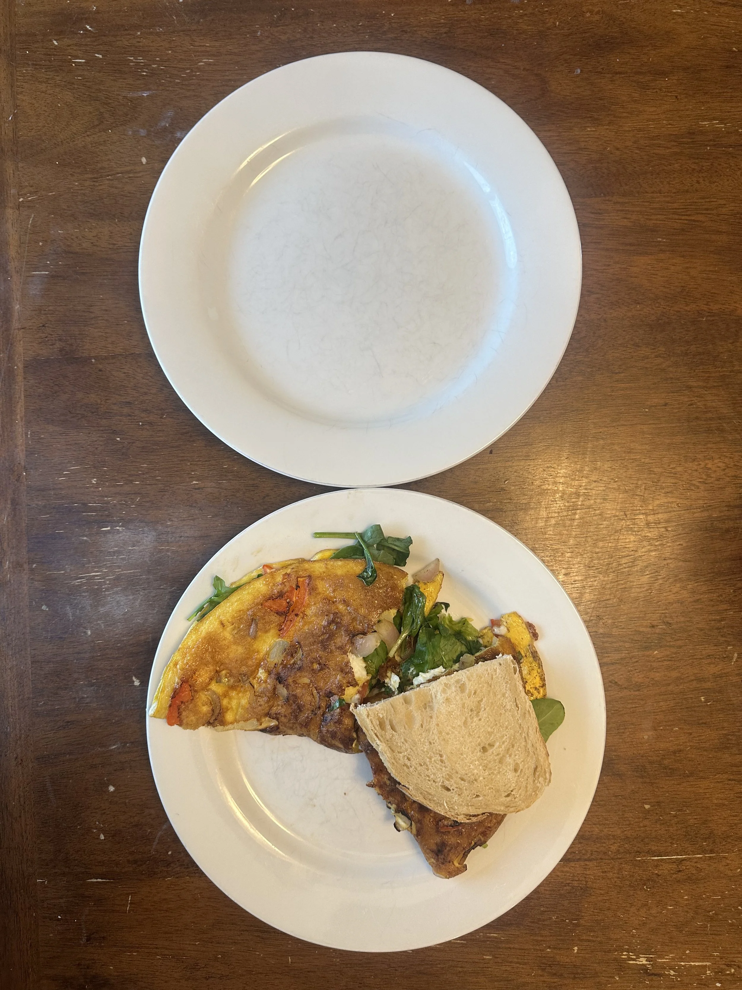 Balanced pre-workout meal with vegetable omelet and toast providing carbohydrates and protein for exercise performance