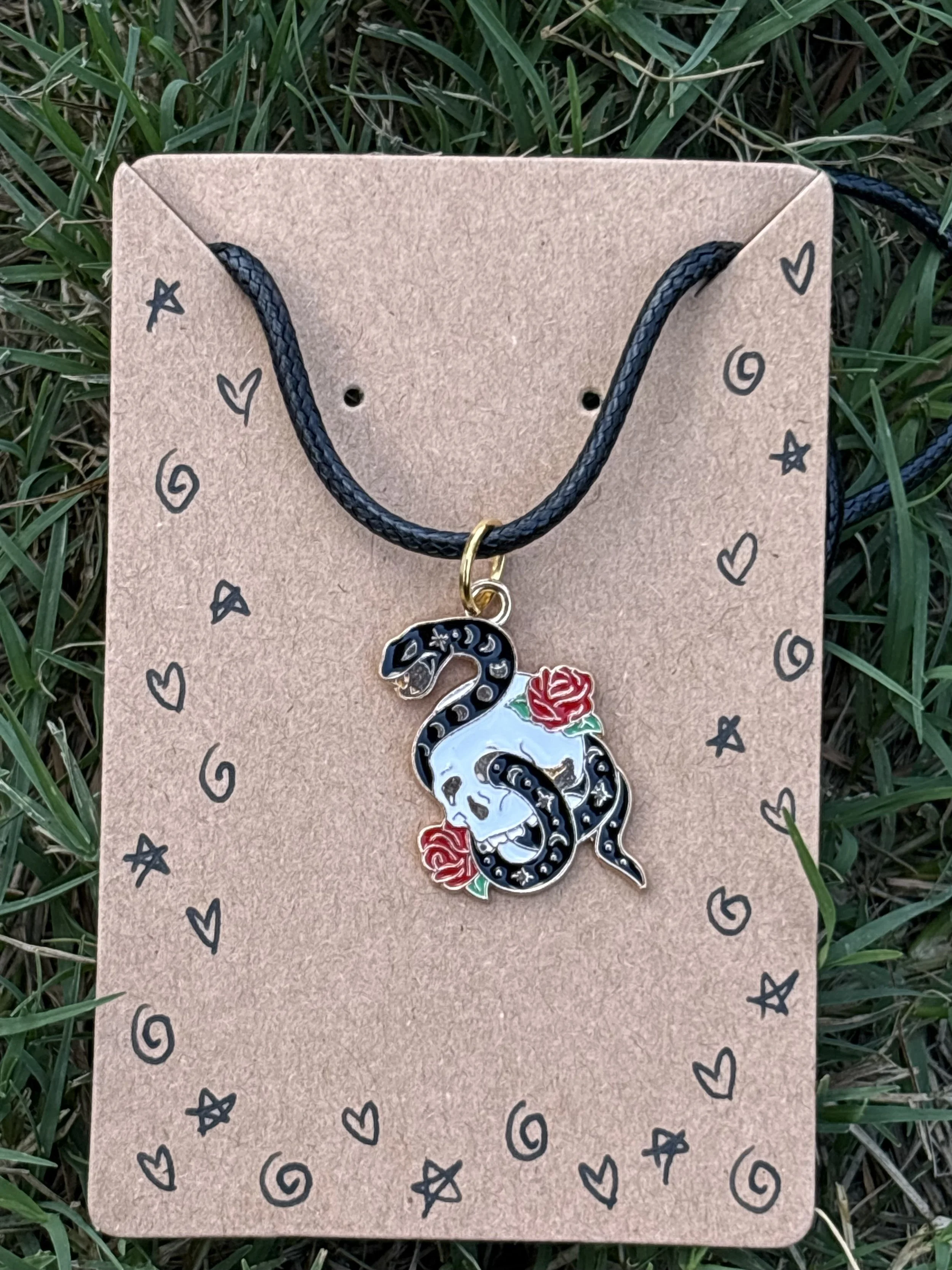 Skulls and snakes necklace