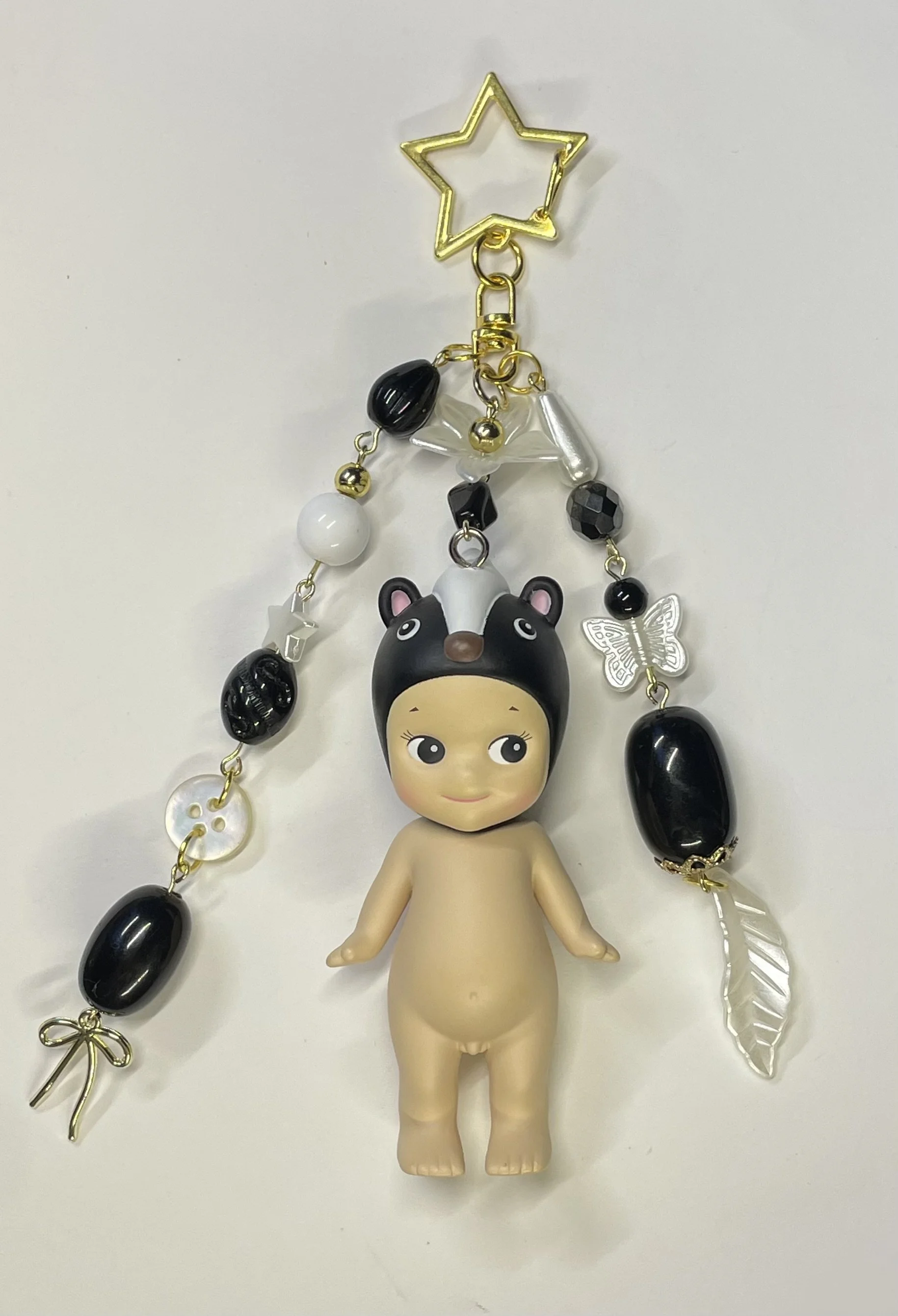 Sonny Angel keychain (skunk).jpg