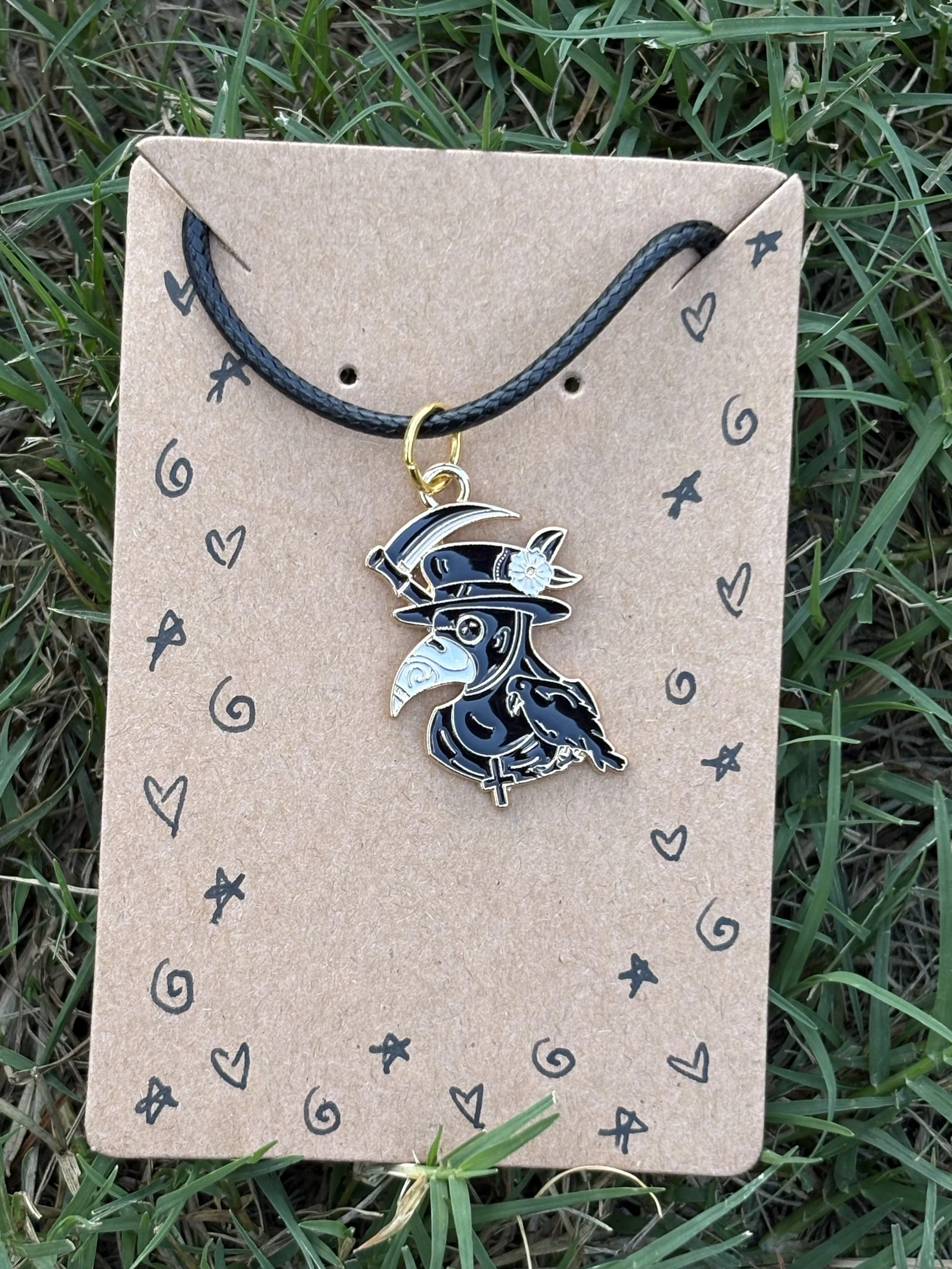 The plague doctor's scythe necklace