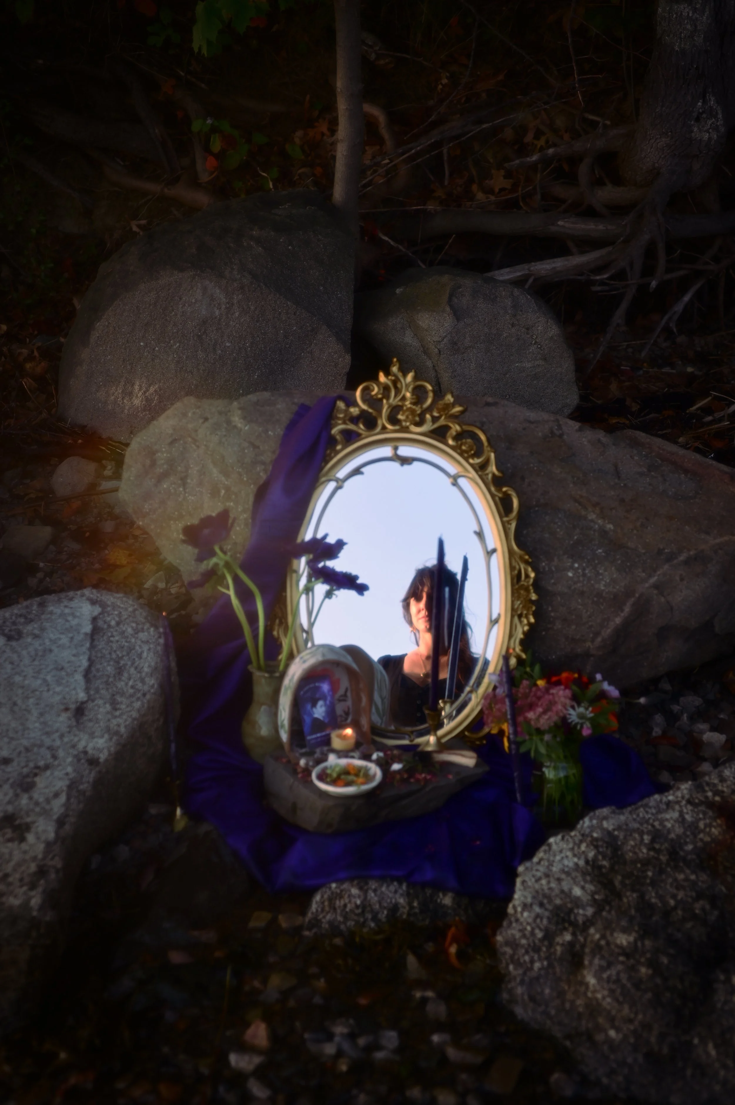 herbalist creating sacred healing altar in nature