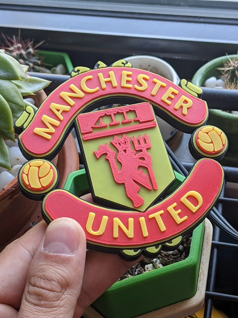 Multicolor Manchester United logo