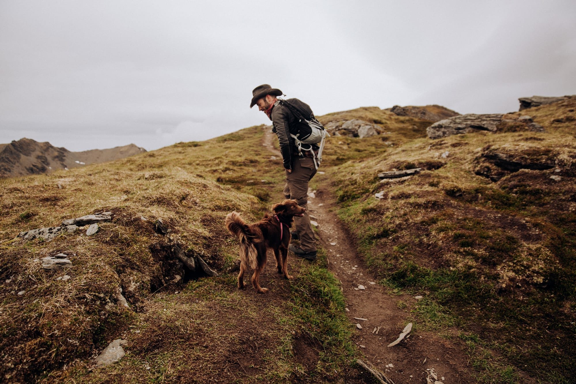 Hiker with his dog up on Hatcher Pass Alaska.jpg
