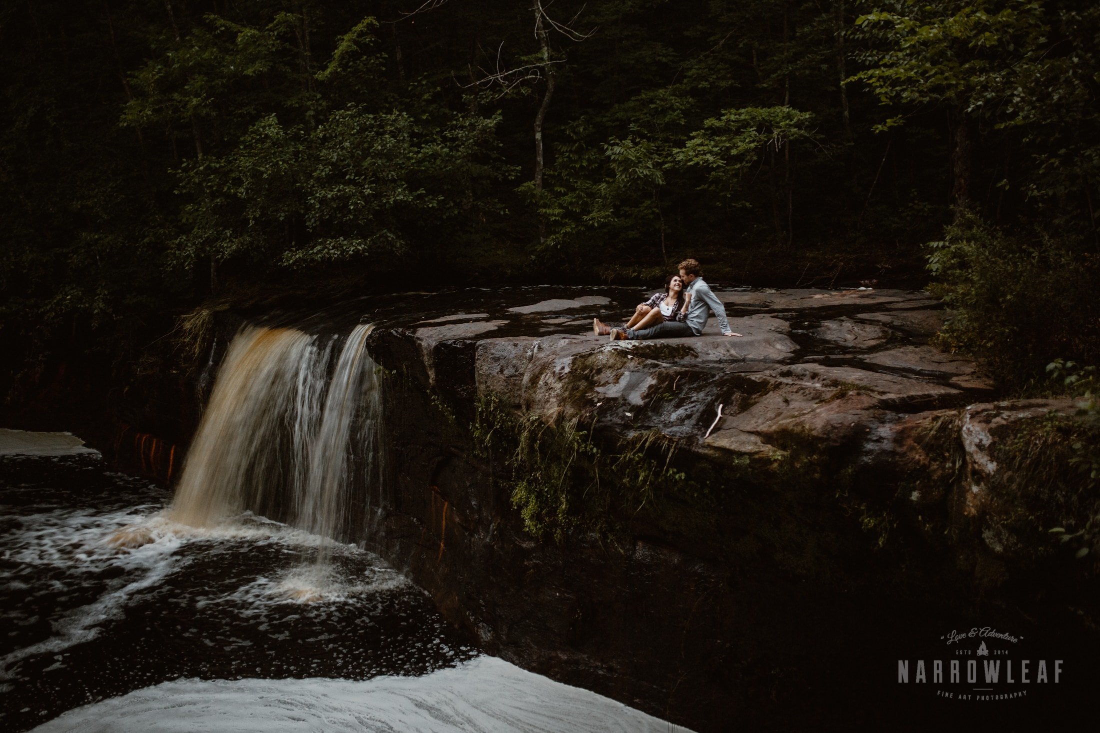 Waterfall engagement photography in Minnesota.jpg