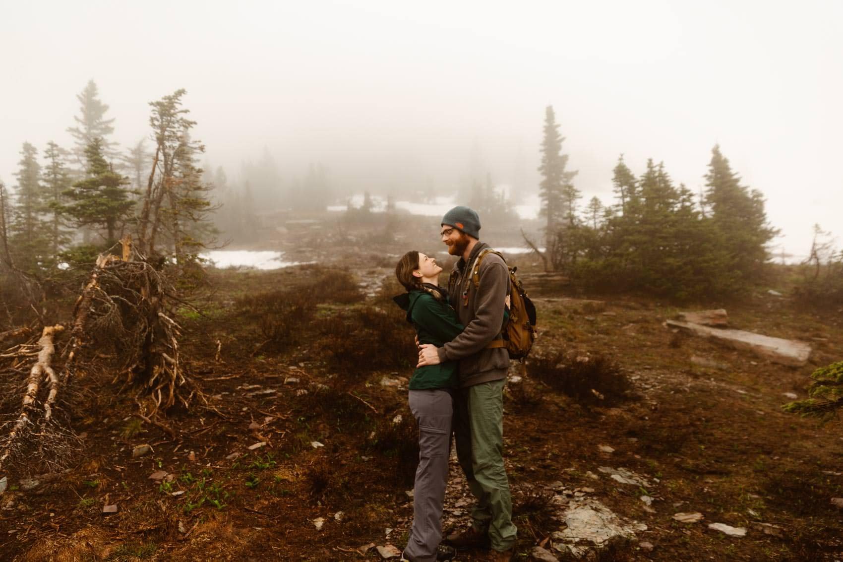 Foggy Montana engagement photography session in the mountains.