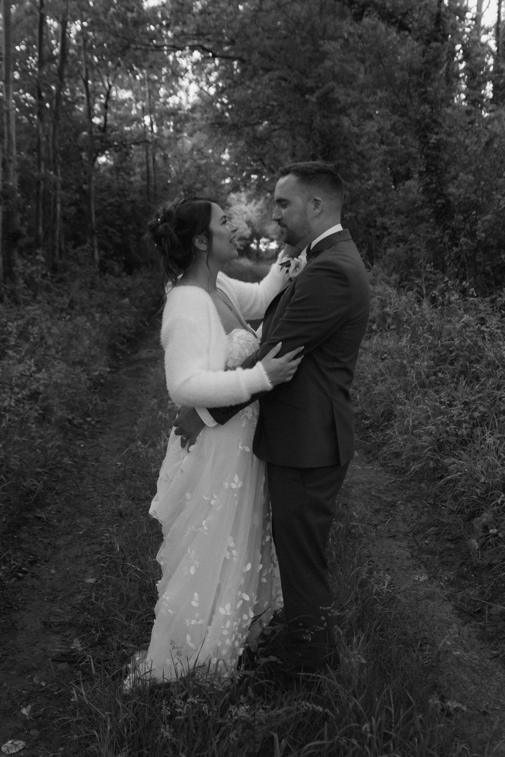 Two people in love at a wedding in the woods