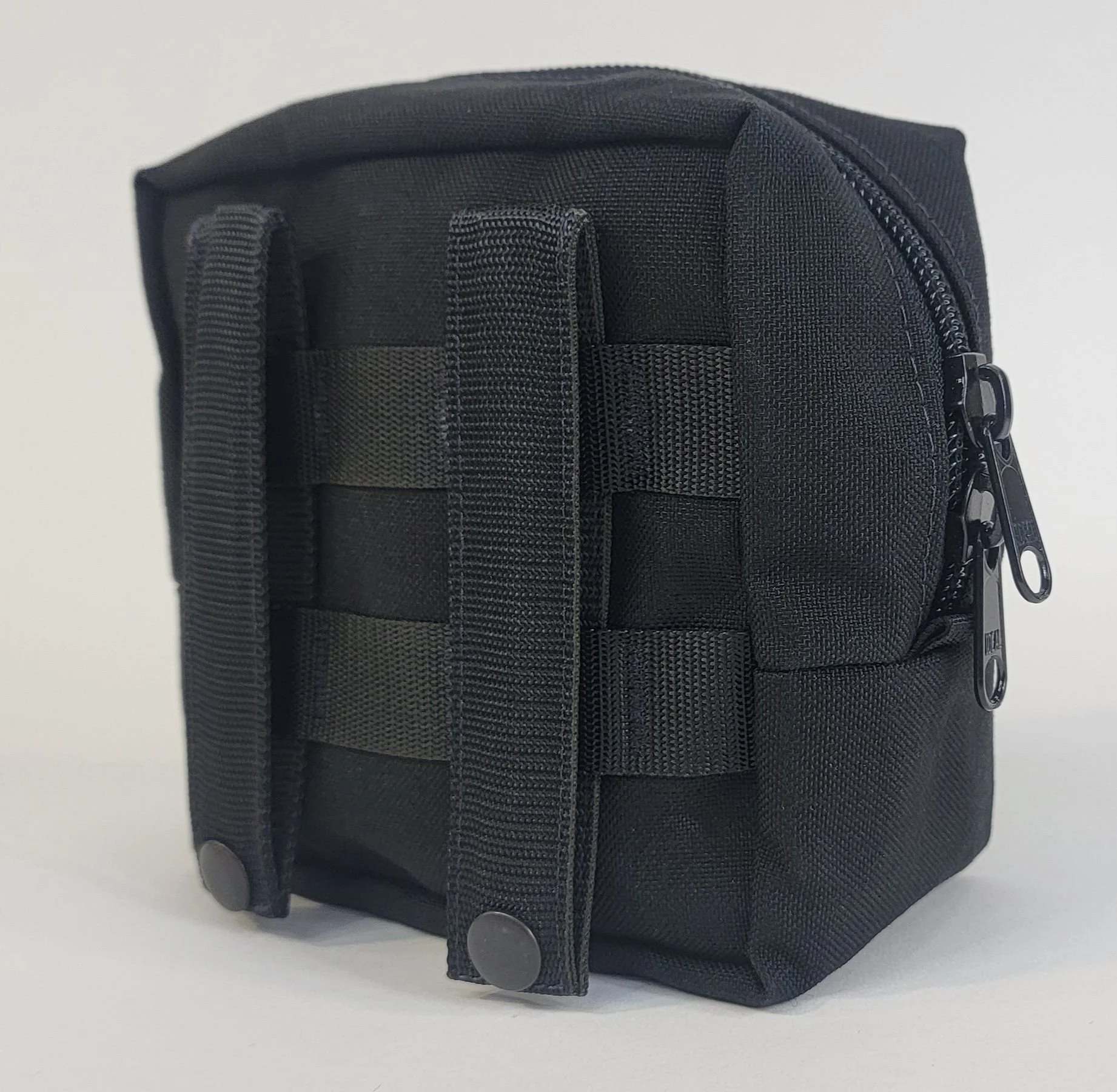 tiny pouch w straps.jpeg