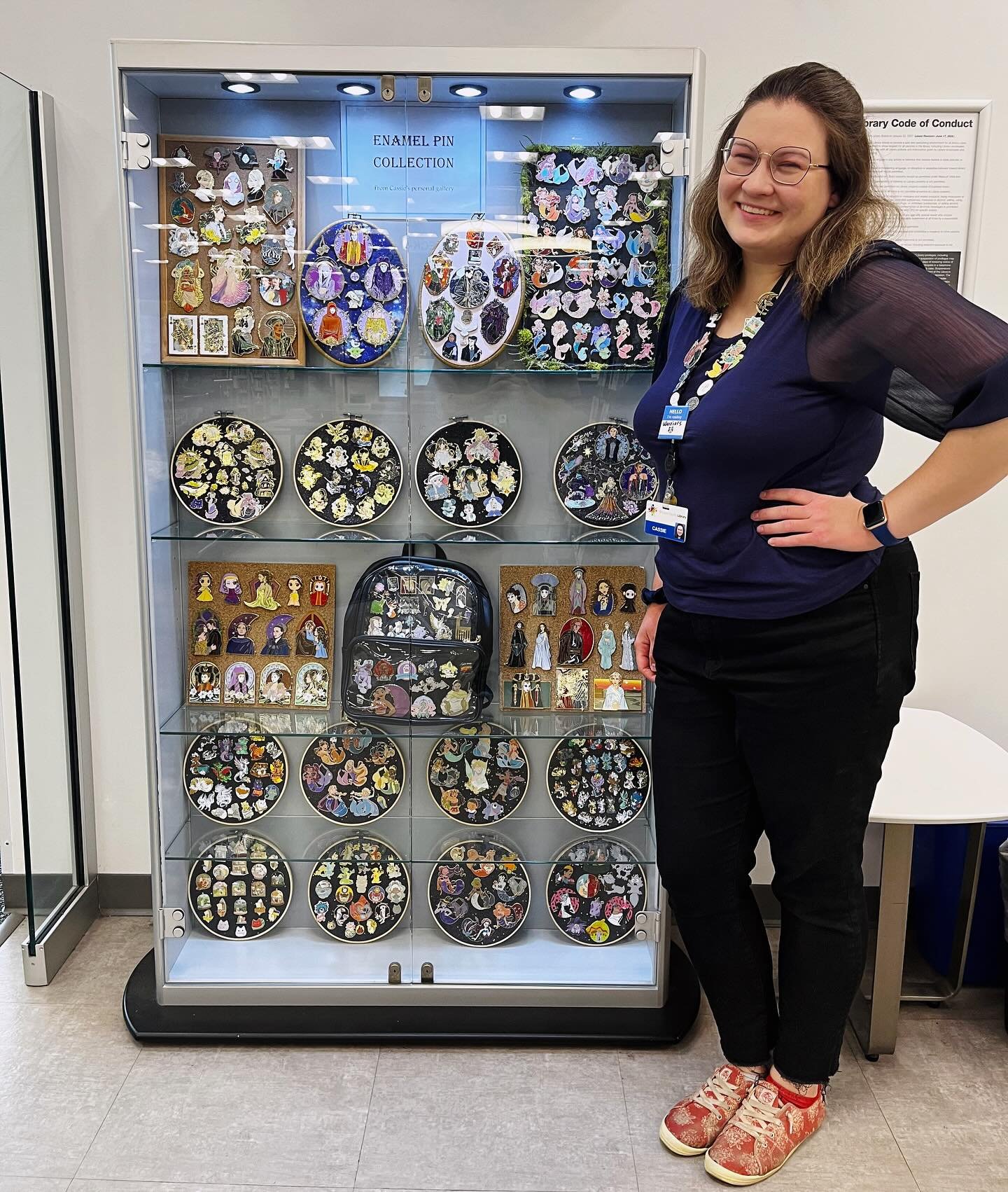 I had the opportunity to display a lot of my enamel pin collection this last month at my library branch! 💜 featuring gorgeous pins from creators like @maxineart , @indyren_pins , @dragonsandbeasties , @keelystudios , @petrichor.fae , @saju.studios ,