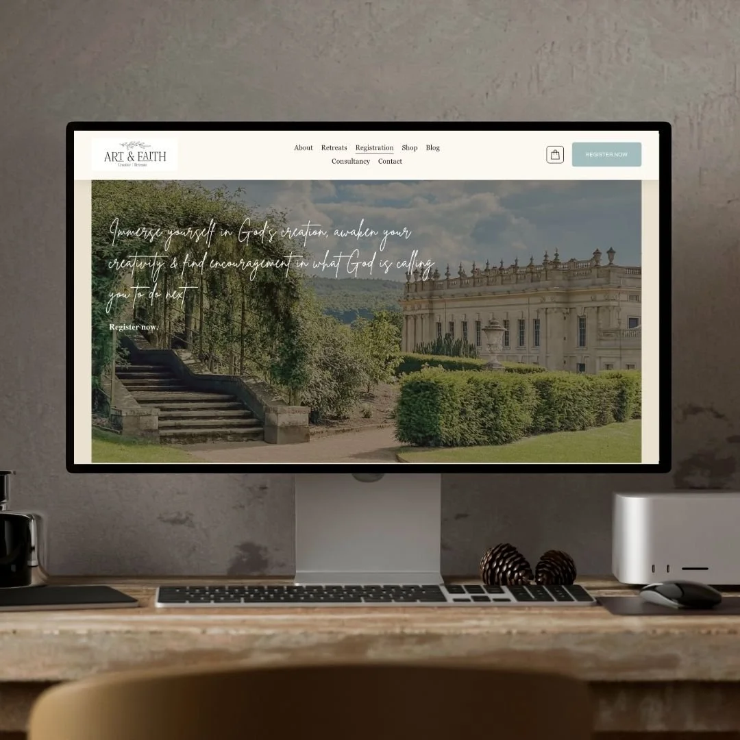 Retreat website design mockup on desktop computer