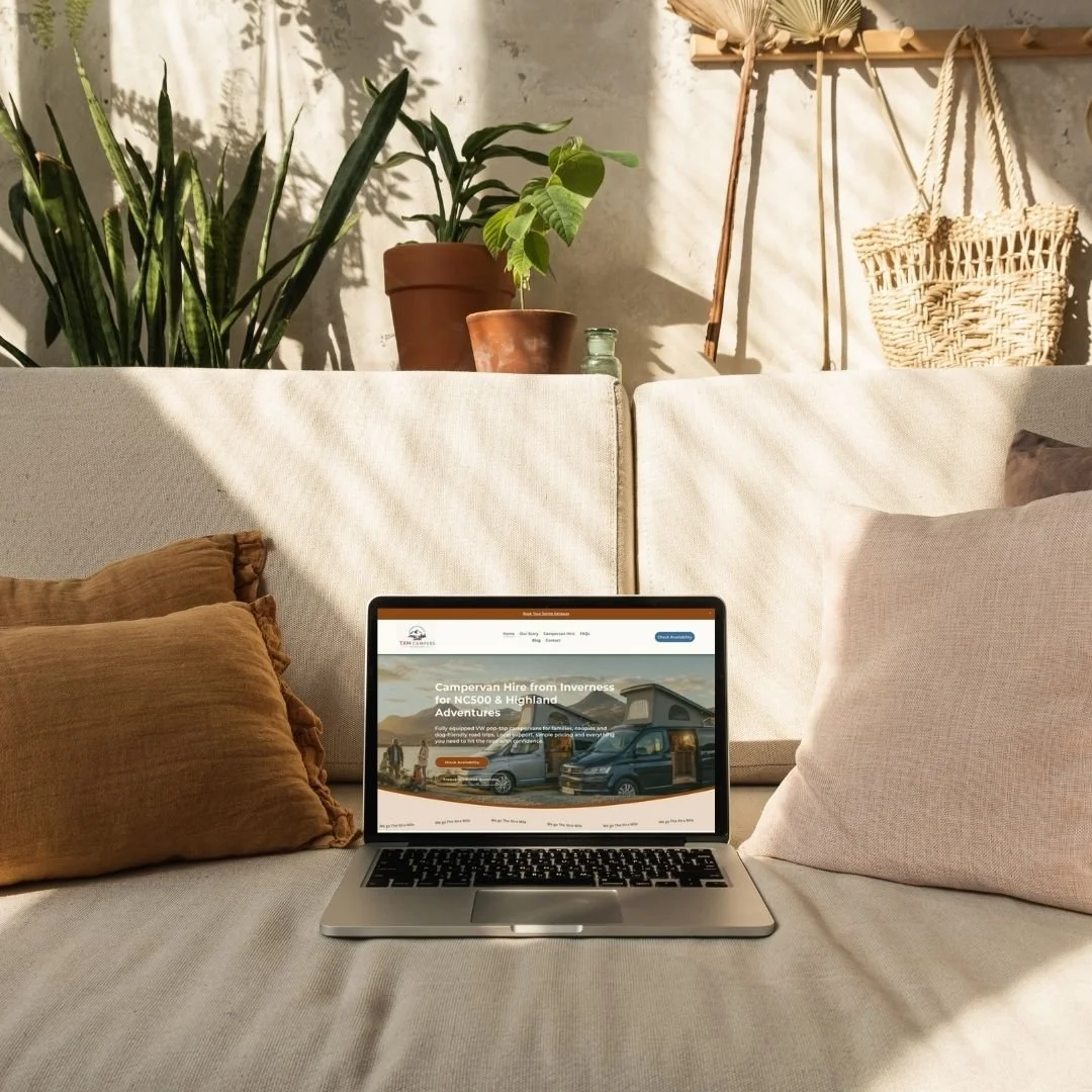Homepage mockup on a MacBook on sofa of a Custom Squarespace Booking Website for a Campervan Business