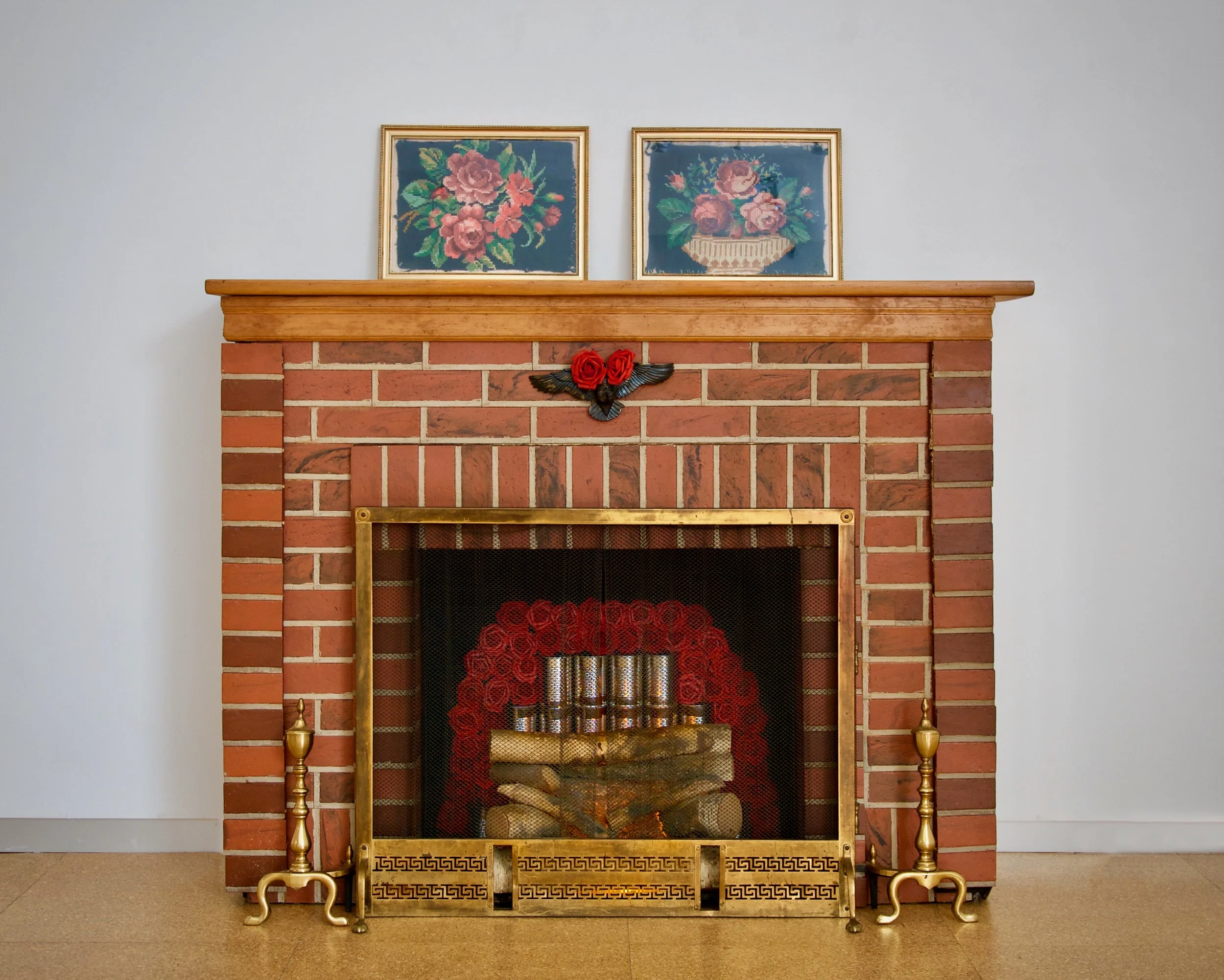 fireplace with cans and roses