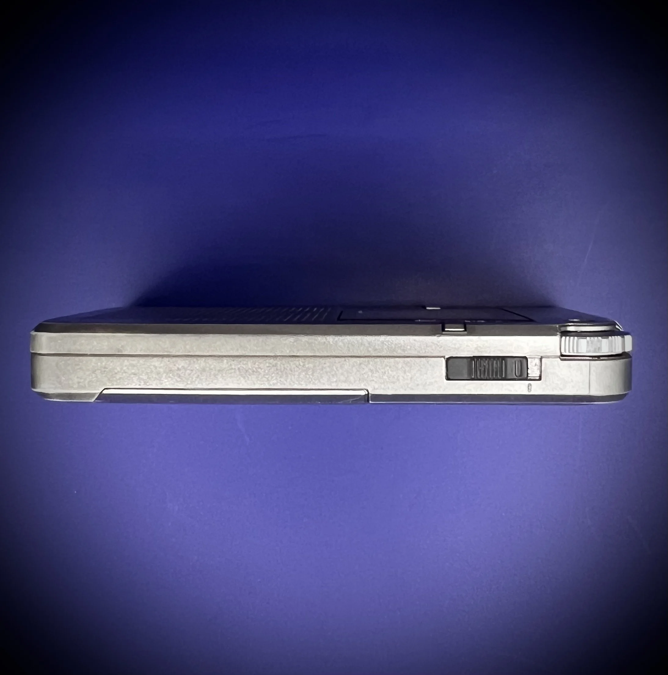 Panasonic RR-DR60 digital voice recorder switch view - blue background