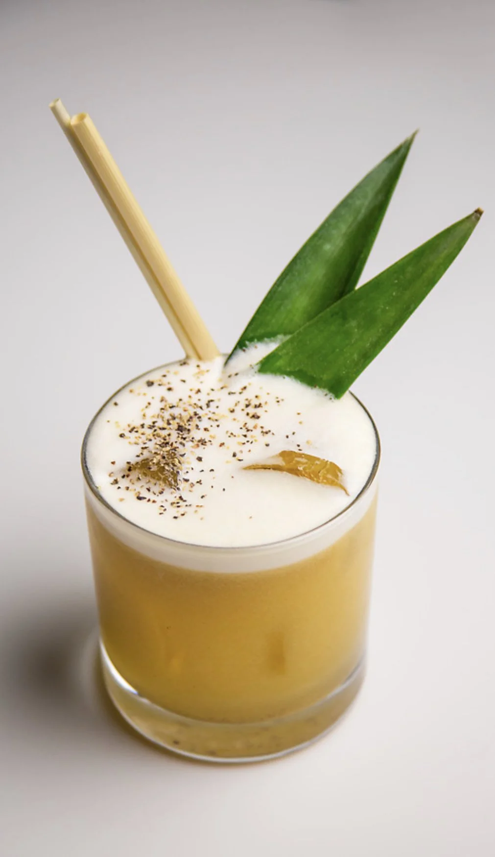 Death, Trapped | black pepper brandy, pineapple, ginger, kalamansi, egg white, MSG

In craft cocktail circles, the chase to create new flavorways is always on. What ingredients can we use to manipulate our perceptions of taste, sight, smell? Much of 