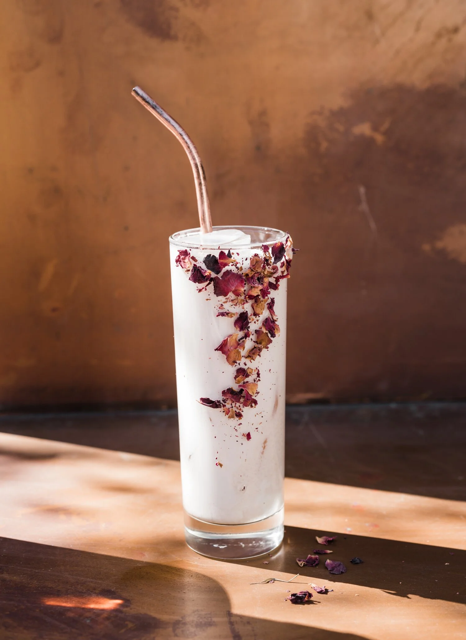 Roxbury Rose Garden | whisky, chamomile, honey, coconut, rosewater, orange blossom water, apple

A cocktail of essential oils and elements meant to represent the essential workers, people, and communities through the pandemic.