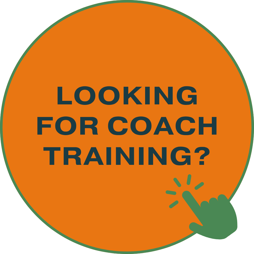 Orange circular button with the text "Looking for coach training?" in bold dark blue font, and a green hand icon pointing at the button.
