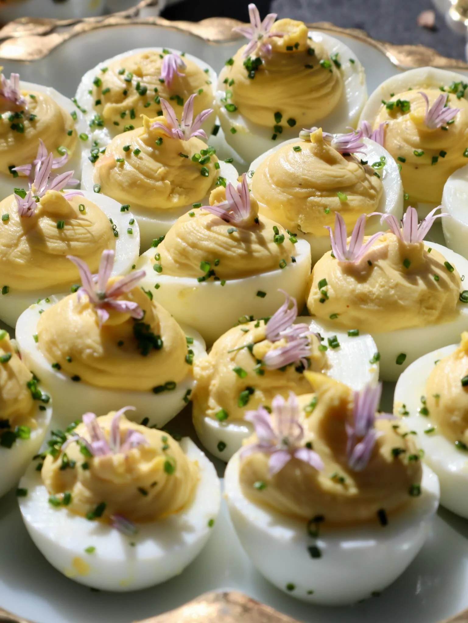 Deviled eggs with garden garnishes 🤍