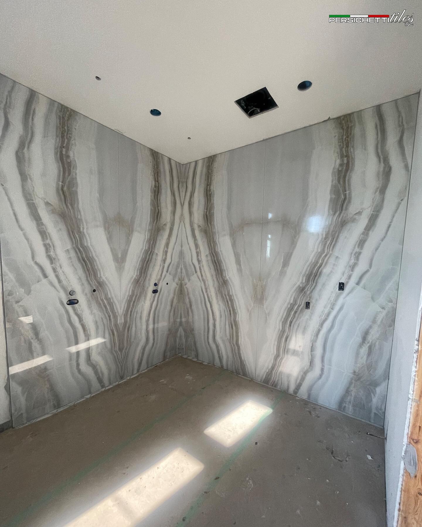 The shower of your dreams !! 

These neutral 9 foot bookmatch slabs make waking up in the morning and getting ready just a little bit easier !! 

We love how this one turned out !! 

#tile #tiledesign #tilestyle #tilework #tiles #tileinstallation #ti
