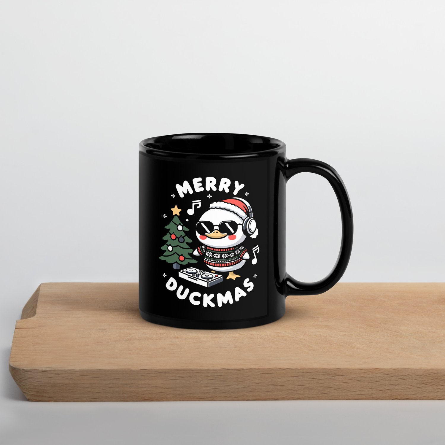 https://images.squarespace-cdn.com/content/v1/61ff1fbee871ae74061b3e95/1699404542526-8WM5MYZJNNCG6362KT0C/black-glossy-mug-black-11-oz-handle-on-right-654adaf45e1ce.jpg?format=1500w