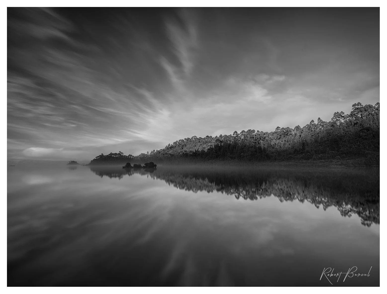 A black and white long exposure photograph exploring stillness, reflection, and balance within the landscape. Fine art photography by Robert Burcul, Tasmania.
