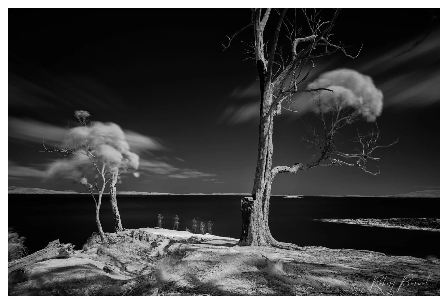 infrared b&w image of seascape with human figure
