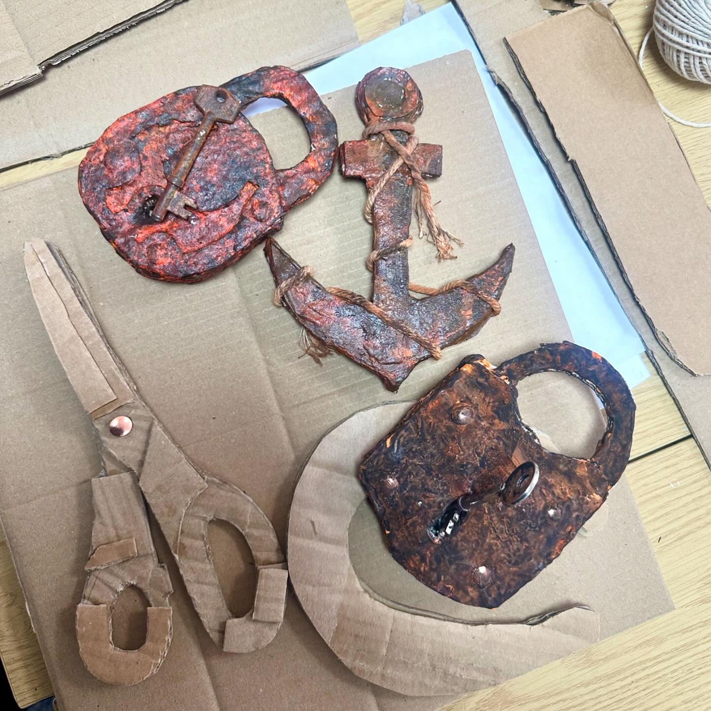 Rusty dusty objects beautifully made by our students using cardboard, plaster of Paris mixed in with pva glue and some paint!!
