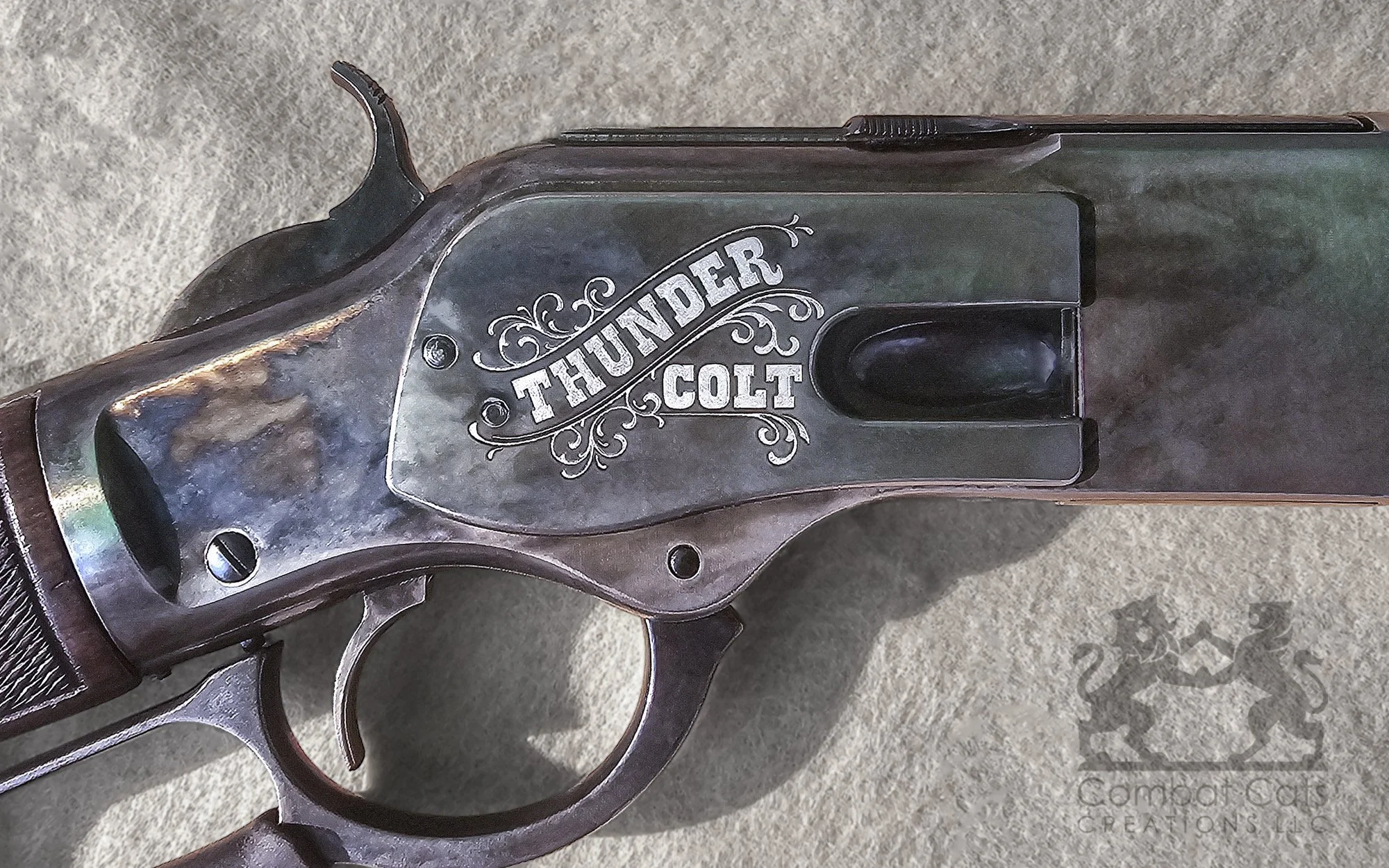 Winchester 1873 rifle featuring “Thunder Colt” laser engraving, adding a personal touch to a classic.