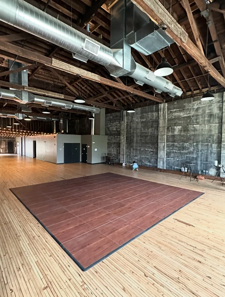 Dark maple dance floor at Olio in Peabody