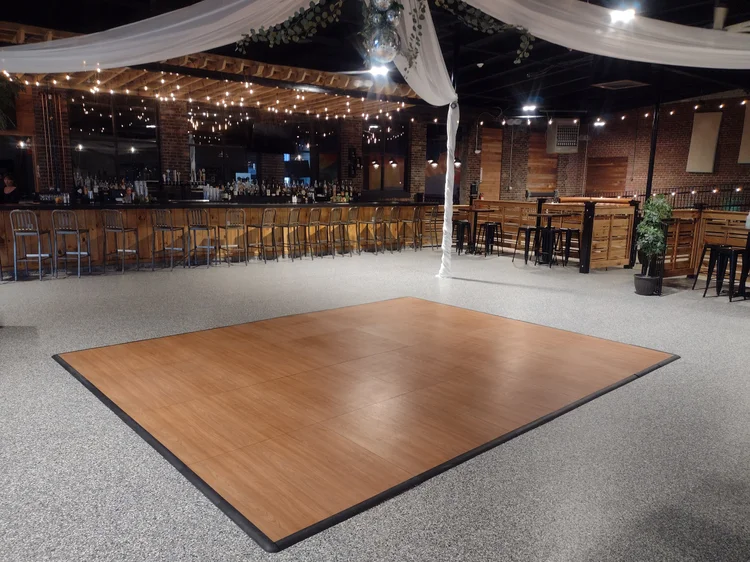 Honey dance floor set up in an event hall