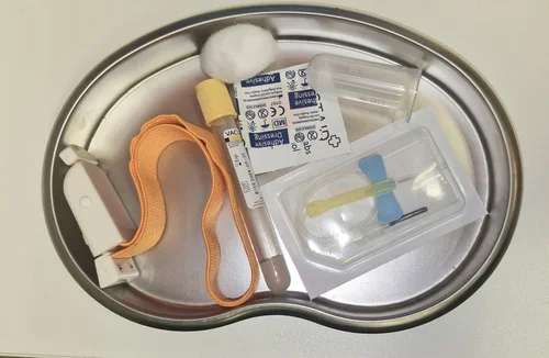 Blood collection kit with sample tubes, tourniquet, swab, and sterile equipment for private blood tests at Imaginatal