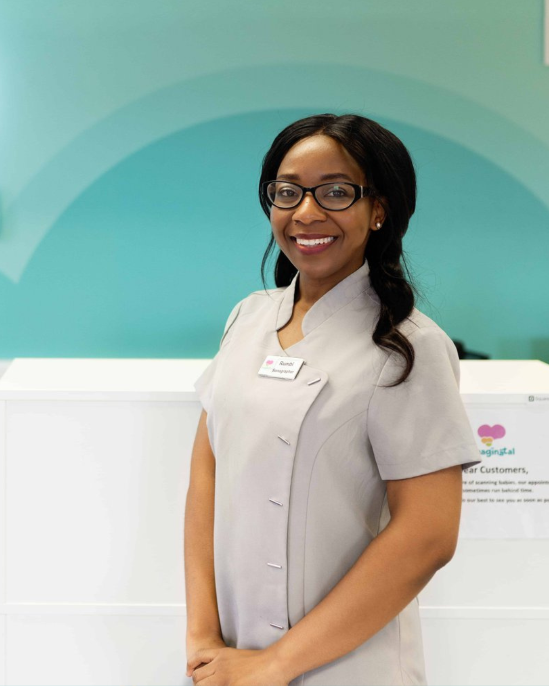 Clinical lead and HCPC-registered sonographer at Imaginatal pregnancy ultrasound clinic smiling in a professional portrait.