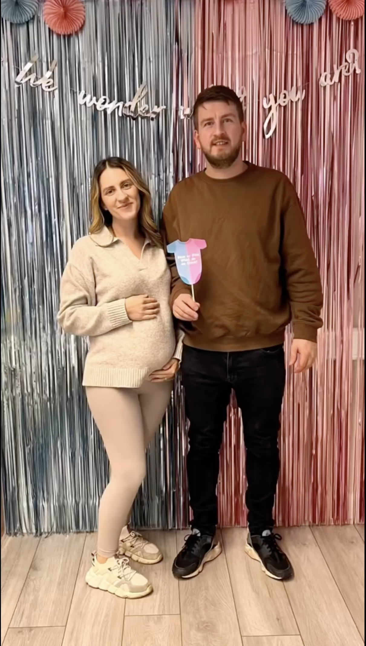 Expectant couple celebrating after a pregnancy growth scan at Imaginatal private ultrasound clinic