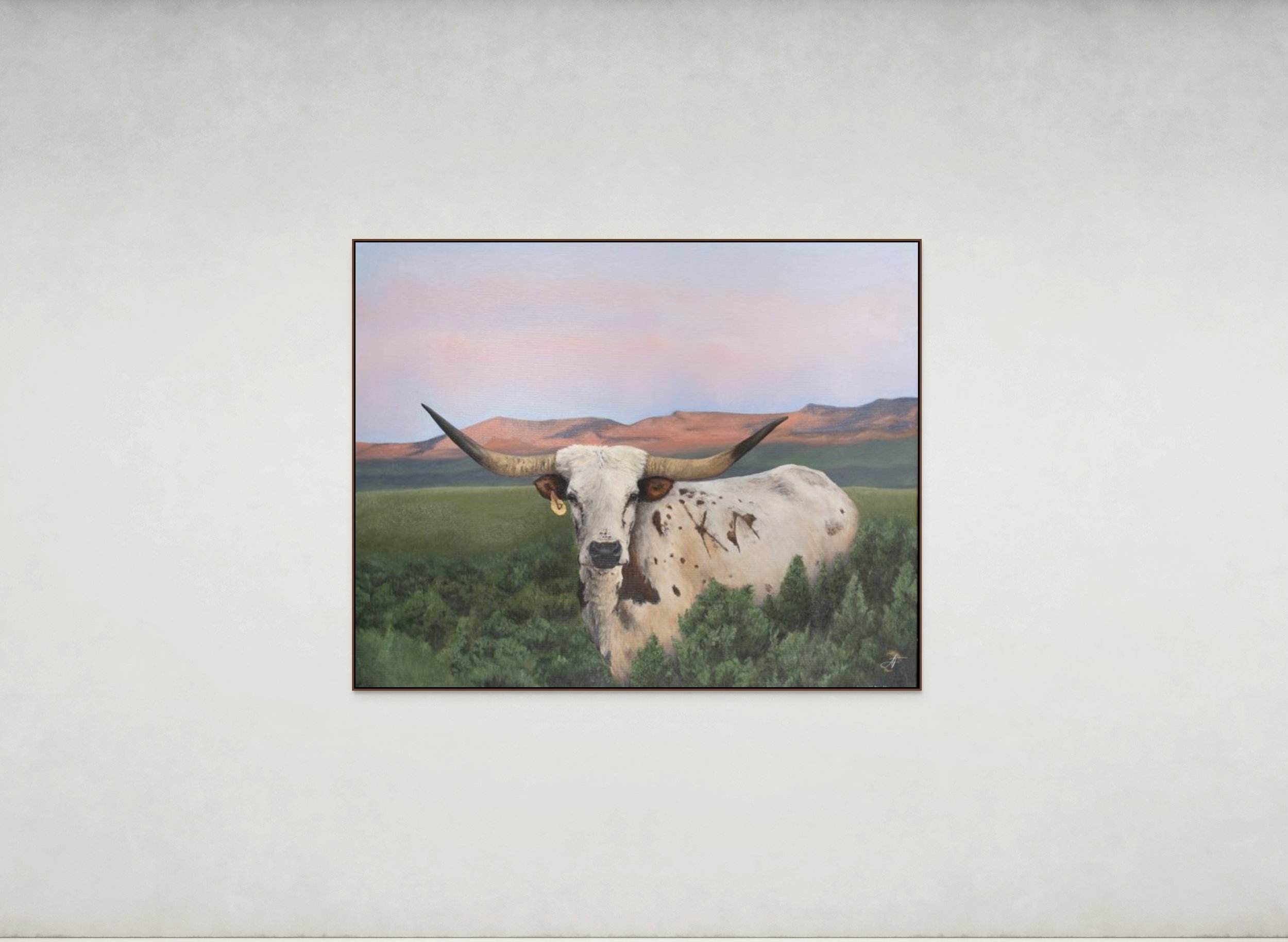 Painting of a Texas Longhorn in a field with mountains in the background