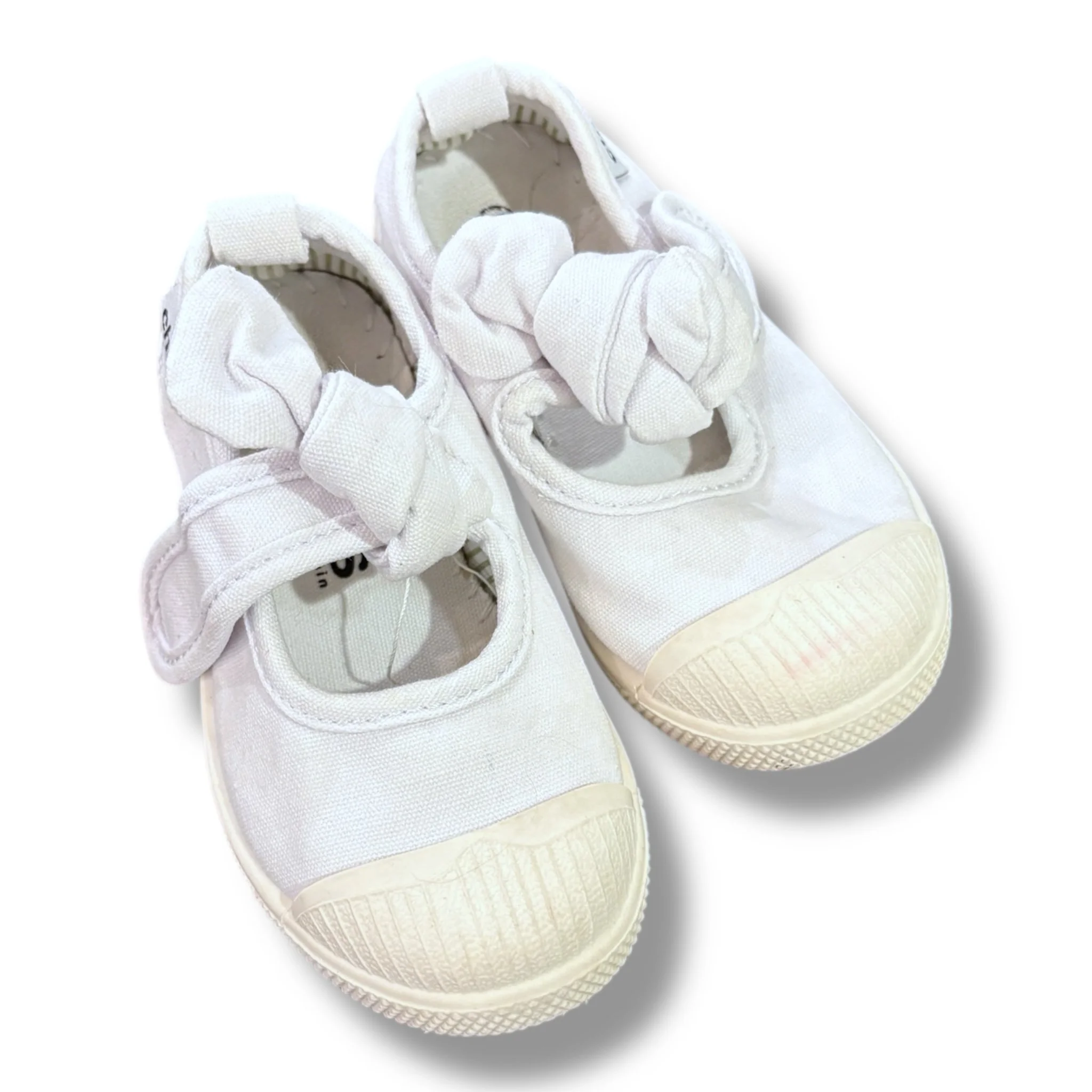 Size toddler 24 (7.5) Chus white canvas sneakers w/ bow (overall wear, untreated spot on toe)